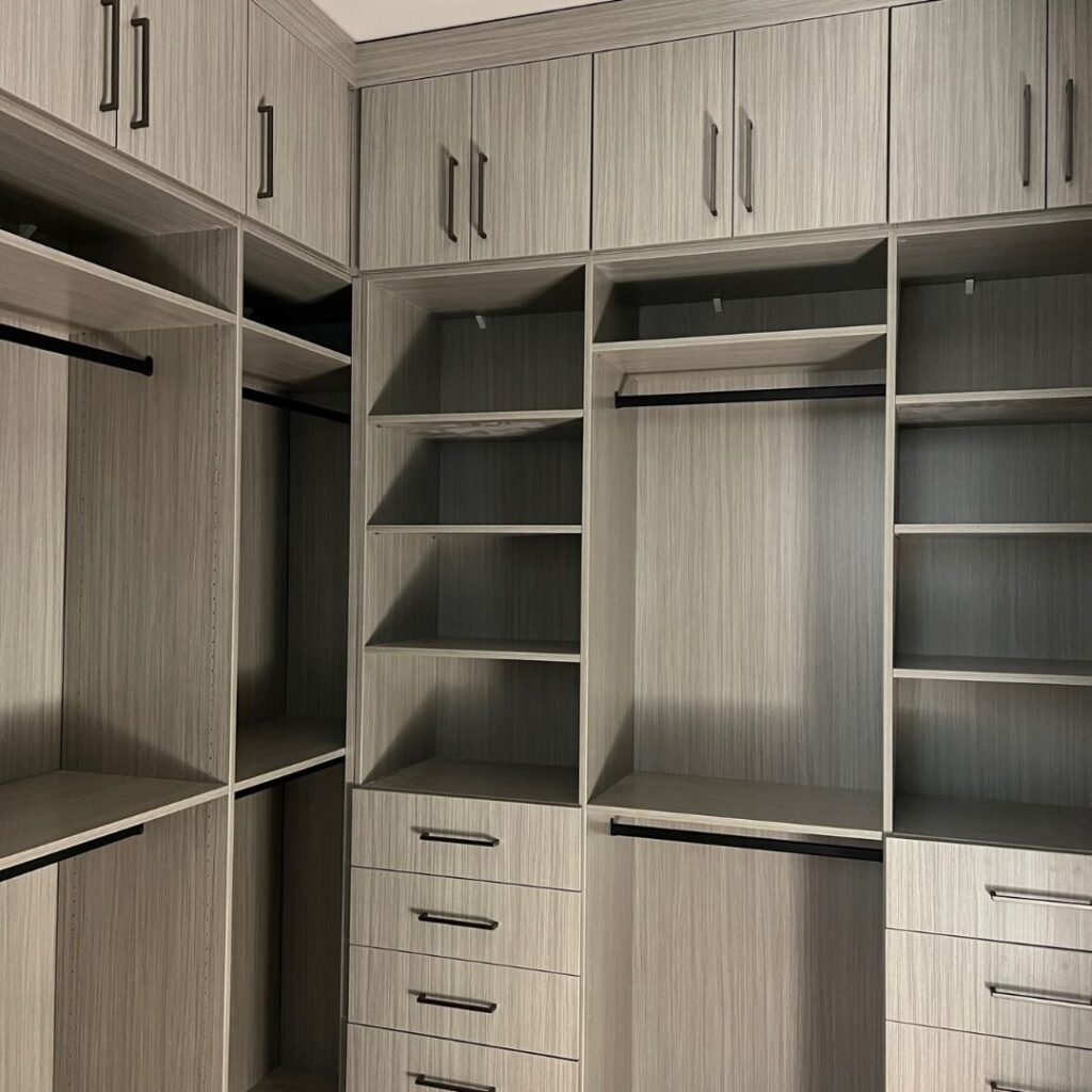 white grain closet cabinets and drawers